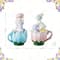 Glitzhome® Set of 2 Easter Resin Bunny on Tulip Mug Table Decor